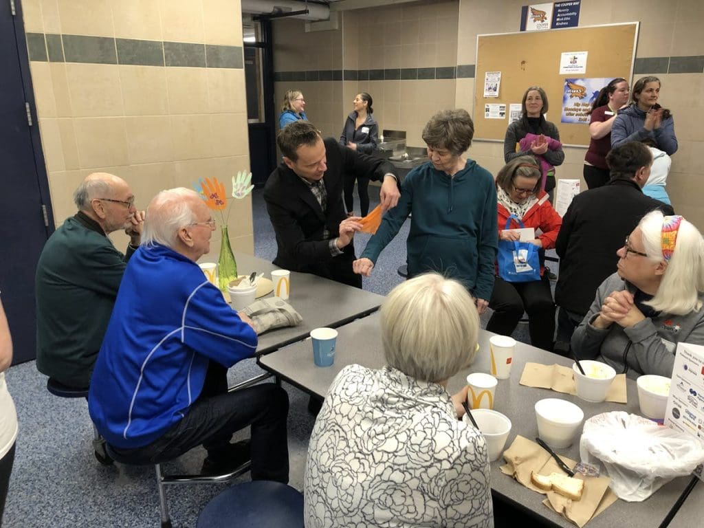 David Farr performs for Sharon Pleimling founder of Empty Bowls